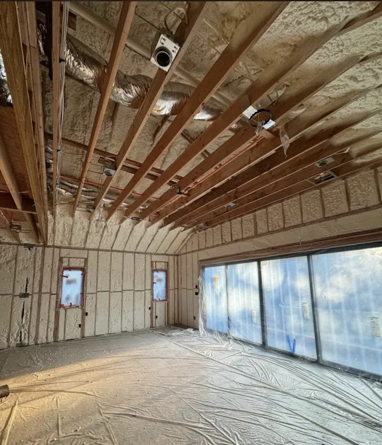 Interior walls and ceiling insulated with spray foam during new construction in Tavares